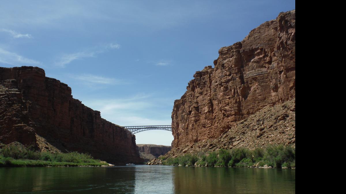 
Navajo Bridges is the first major landmark seen during most Grand Canyon rafting trips. The original bridge opened in 1929, followed by a second bridge in 1995. The original bridge is now used by pedestrians. No other bridges span the Colorado downstream for more than 260 miles, all the way to Lake Mead outside Las Vegas.
