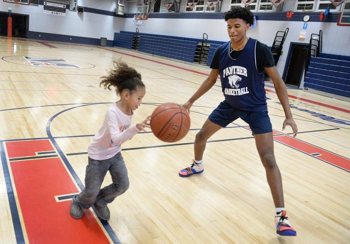Six-year-old Jurnee Green puts her dribbling moves on big brother Jalen, the Memorial High sophomore who just happens to be the nation’s No. 1 recruit in the class of 2020.