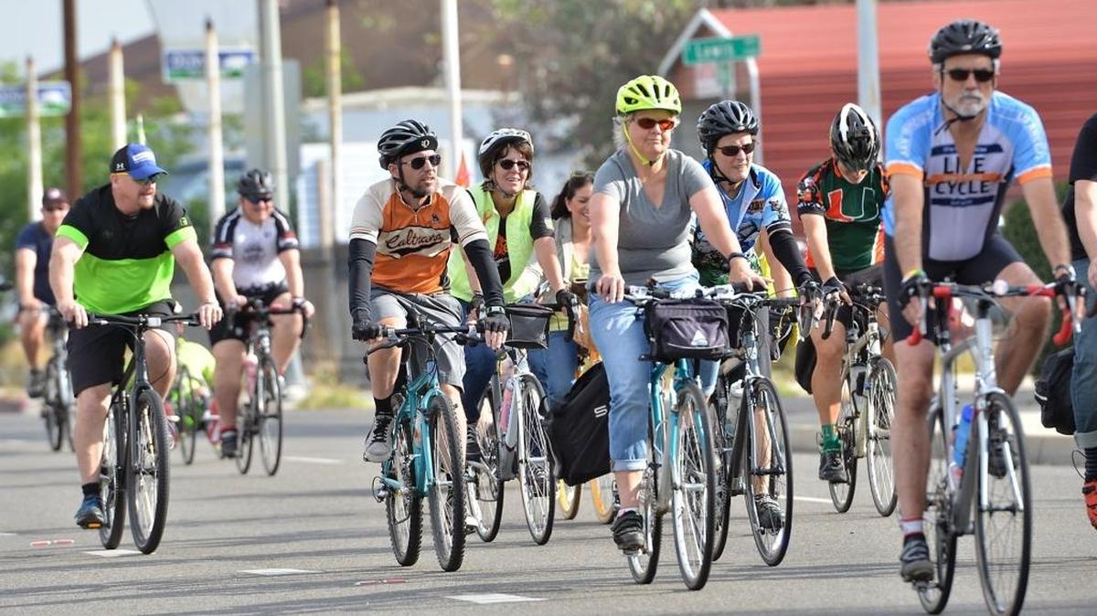 Fresno-area cyclsists ride down Blackstone Avenue during last year’s Mall 2 Mall Bike Ride. The California State Assembly is considering a bill that would make it legal for cyclists to roll through stop signs “unless safety considerations require otherwise.”