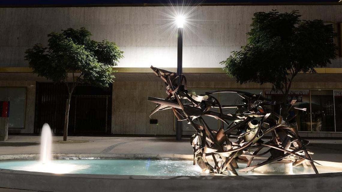 “Smoldering Fires” is one of three copper and glass sculptures by California artist Claire Falkenstein located near the outfield entrance to Chukchansi Park in downtown Fresno. This photo was taken prior to the Fulton Street reopening in October 2017. Between July 2020 and March 2021, all three statues were severely damaged by thieves and vandals and removed.