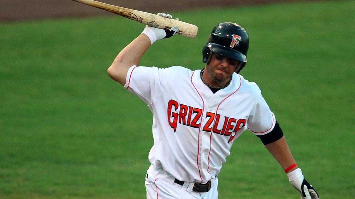 
Ex-Grizzlies infielder Kevin Frandsen throws his bat away in frustration after popping out during a 2009 game at Chukchansi Park. Before the game, Frandsen learned the Giants had blocked his path to the majors by trading for all-star second baseman Freddy Lewis. Grizzlies manager Dan Rohn didn’t appreciate the bat throw; he benched Frandsen in the second inning.
