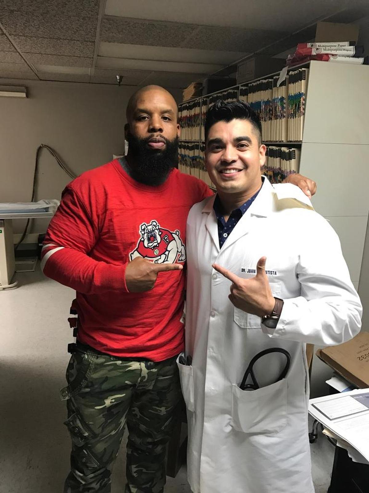 Former Fresno State cornerback Dante Marsh, left, returned to school and finished his degree thanks to a boost from ex-teammate Juan Bautista, who practices family medicine in his hometown.