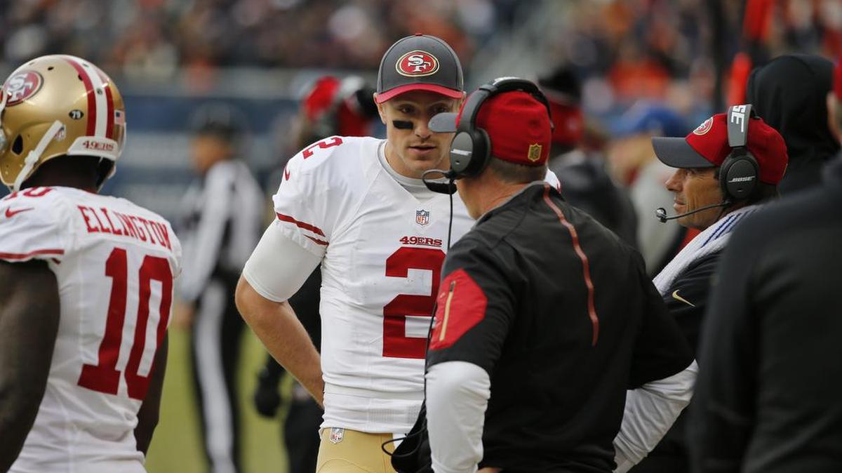 San Francisco 49ers quarterback Blaine Gabbert (2) talks with head coach Jim Tomsula during the second half of their game against the Chicago Bears on Sunday, Dec. 6, 2015.