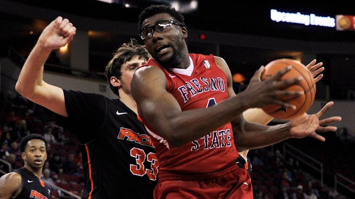 Fresno State junior Karachi Edo drives past Pacific’s Ilias Theodorou in a December 2015 game at Save Mart Center. Leaping and dunking have come easily for the forward, who continues to work on other aspects of his game. “I’ve got a two-dribble limit,” Edo says of his ball-handling. “To become a complete basketball player, that’s something I have to work on.”