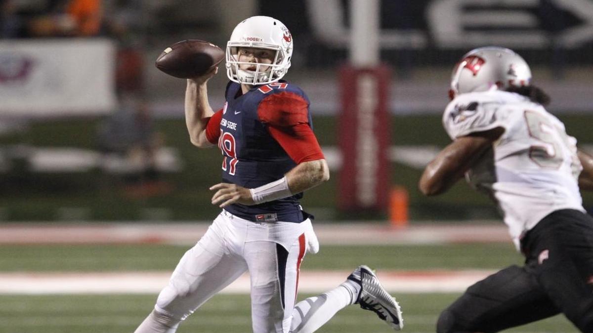 Fresno State’s Kilton Anderson looks for a receiver while on the move during the second half of the Bulldogs’ 31-28 victory over UNLV on Oct. 16 that ended a five-game losing streak.
