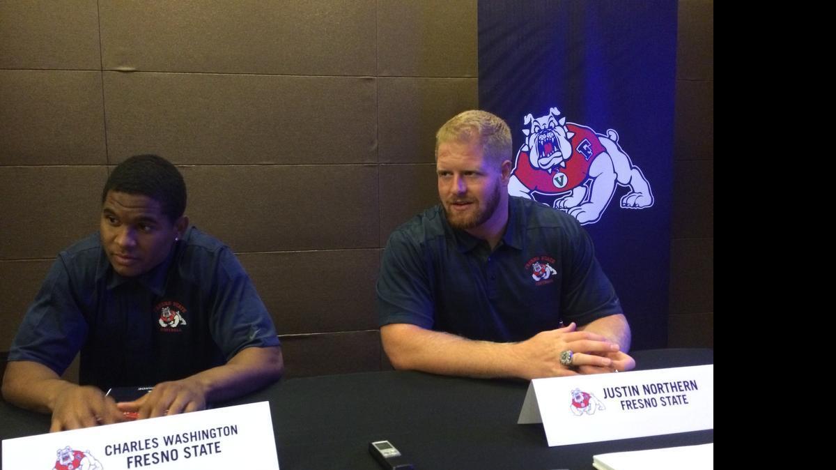 
Fresno State teammates Charles Washington, left, and Justin Northern field questions from the media during the Mountain West Conference Football Media Days in Las Vegas. Cost of attendance stipends were a major topic of discussion.
