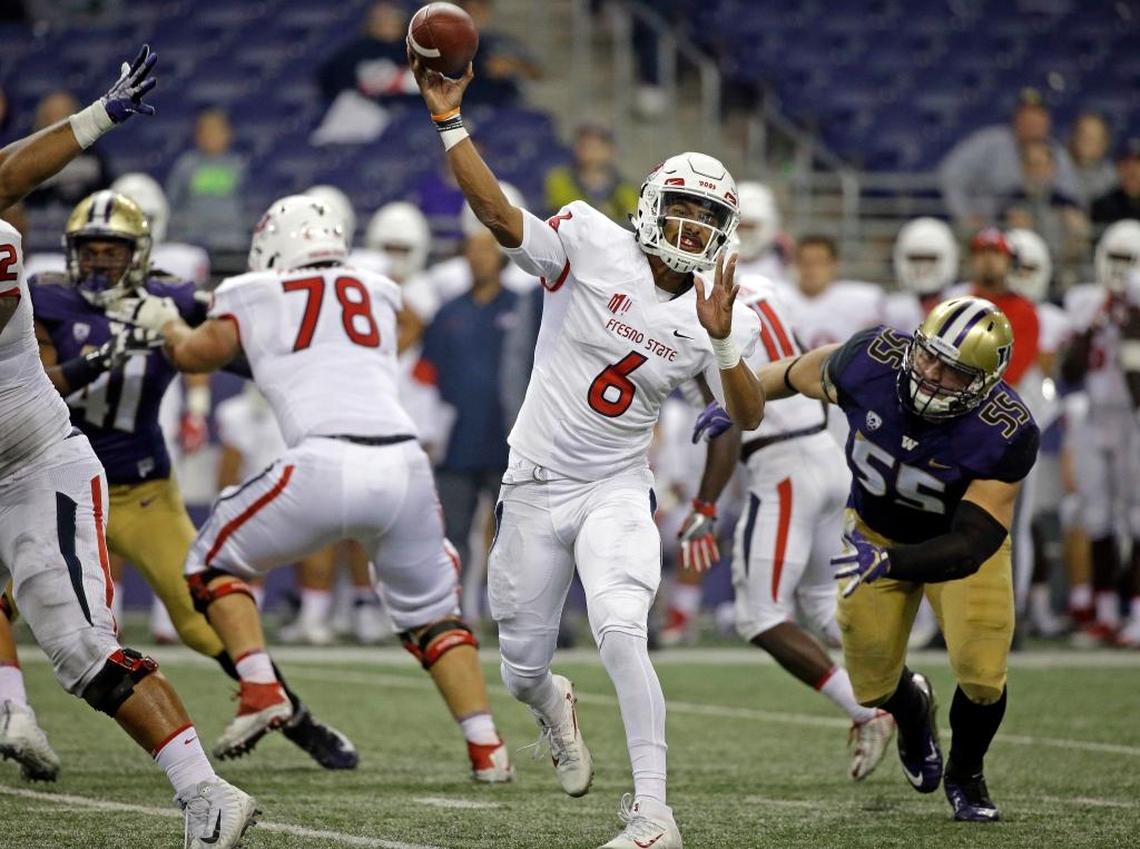 Fresno State quarterback Marcus McMaryion passes against Washington during the second half Saturday, Sept. 16, 2017, in Seattle. McMaryion came on with the outcome no longer in doubt, going 10 for 16 for 96 yards as the Bulldogs fell to the Huskies 48-16.