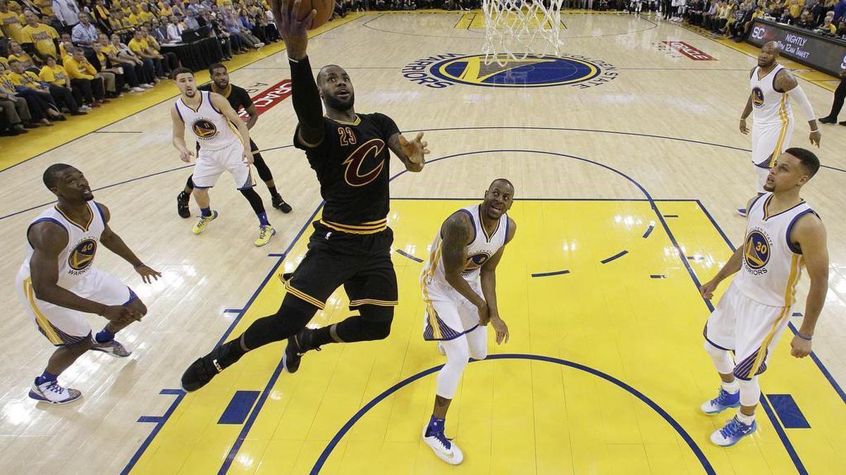 Cleveland Cavaliers forward LeBron James (23) shoots against the Golden State Warriors during the first half of Game 5 of basketball's NBA Finals in Oakland, Calif., Monday, June 13, 2016.