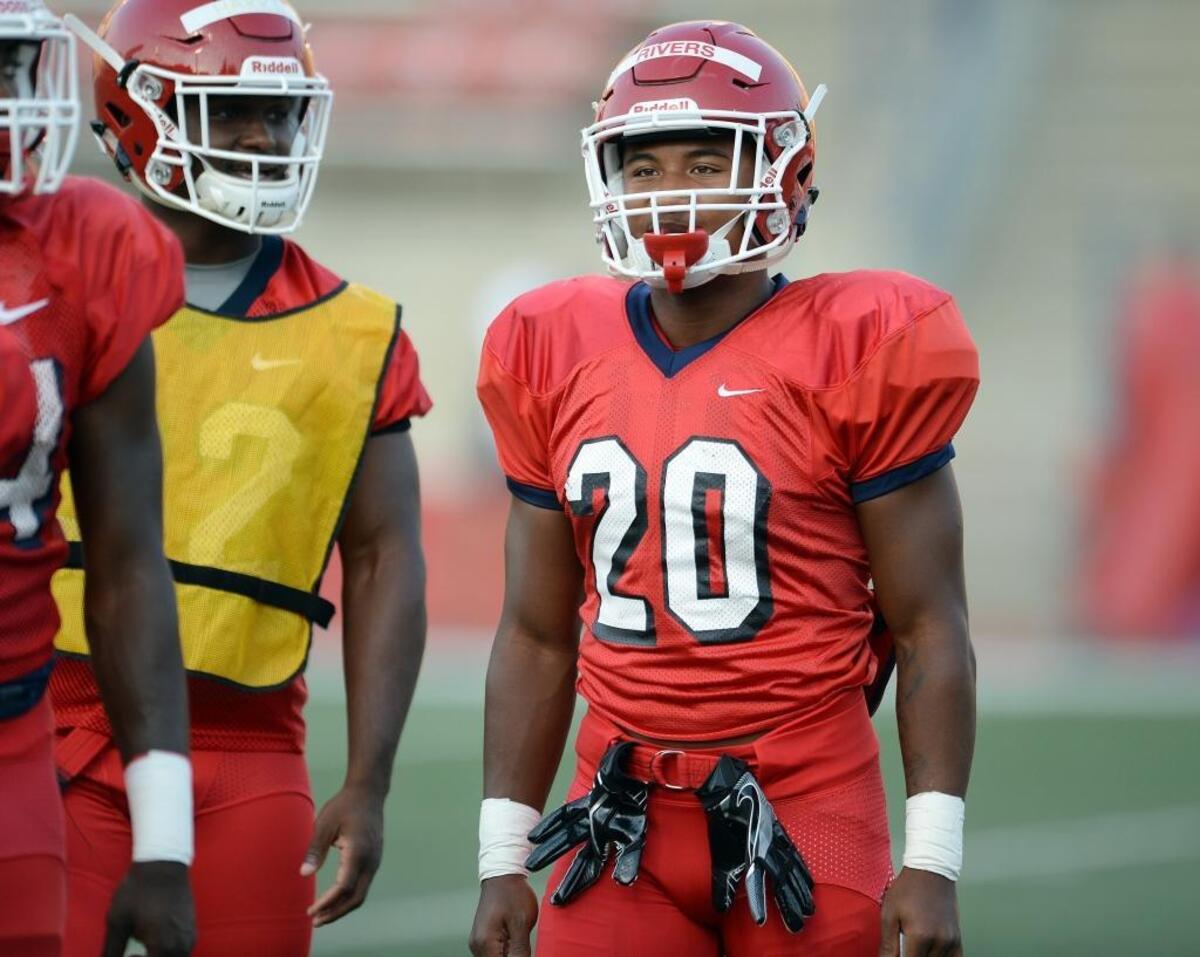 Freshman tailback Ronnie Rivers (20), along with classmate Jordan Mims, have both made a quick impression during their first fall camp with the Fresno State football. Neither will redshirt this season.