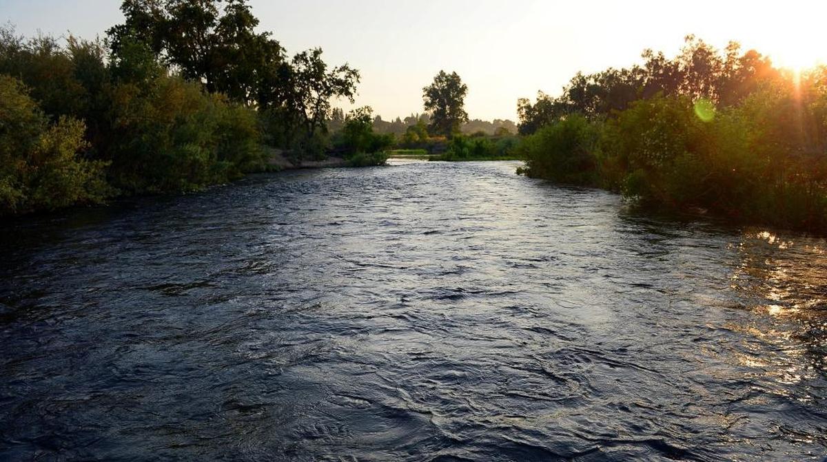 Water flows westward on San Joaquin River just north of Fresno on Thursday, Aug. 24, 2017. The River West Fresno Open Space project would provide much-needed access, if the long-delayed park ever gets built.
