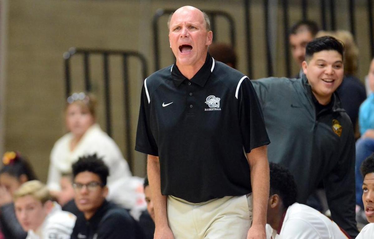 Clovis West High boys basketball coach Vance Walberg makes a point, loudly, during Wednesday night’s home opener of his second tenure with the Golden Eagles.