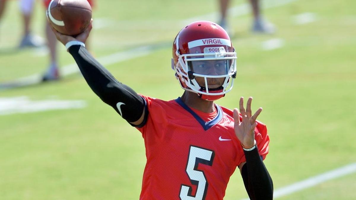 Quarterback Chason Virgil fires a pass during Thursday’s first day of fall camp for the Fresno State football team. Hurt in his third game as a rookie last season, Virgil won back that year of eligibility and will open 2016 as a redshirt freshman and the early leader for the starting job.