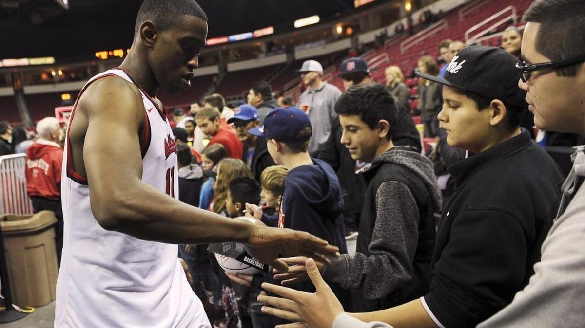 Freshman forward Bryson Williams greets Bulldogs fans following Fresno State’s 85-70 victory over Wyoming on Wednesday night at the Save Mart Center.