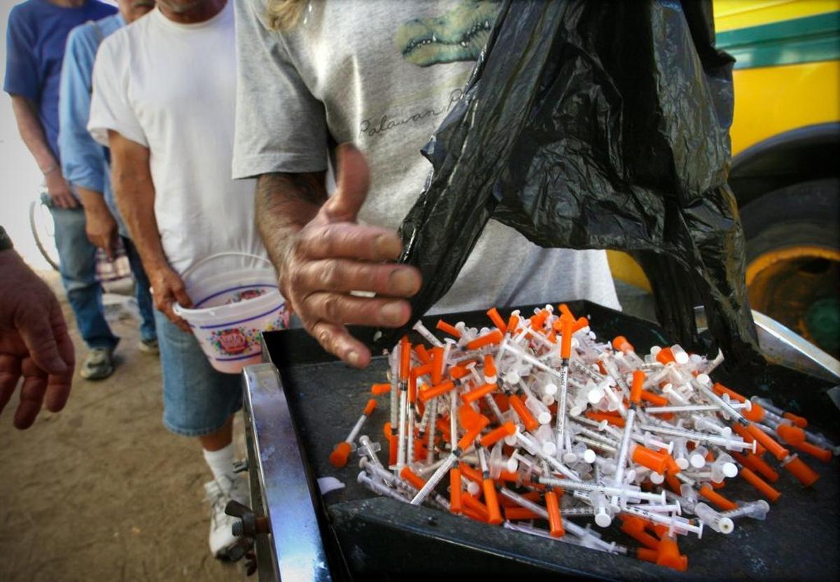 Users of injection drugs exchange hundreds of used hypodermic needles for new ones through the San Joaquin Valley Free Medical Clinic and Needle Exchange in this Fresno Bee file photo.