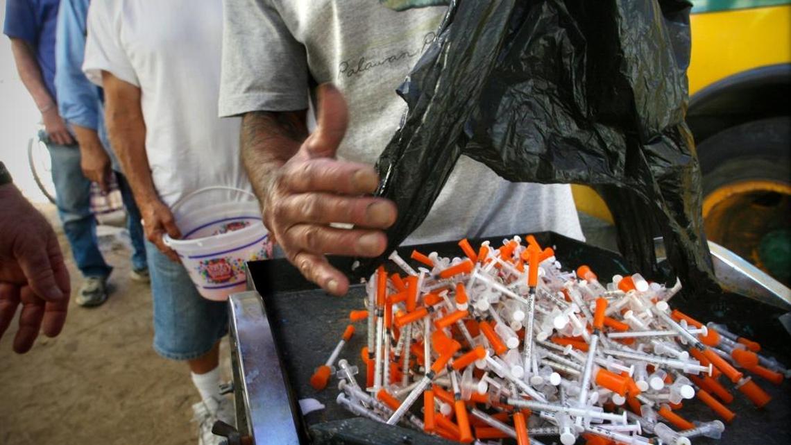 Users of injection drugs exchange hundreds of used hypodermic needles for new ones through the San Joaquin Valley Free Medical Clinic and Needle Exchange in this Fresno Bee file photo.