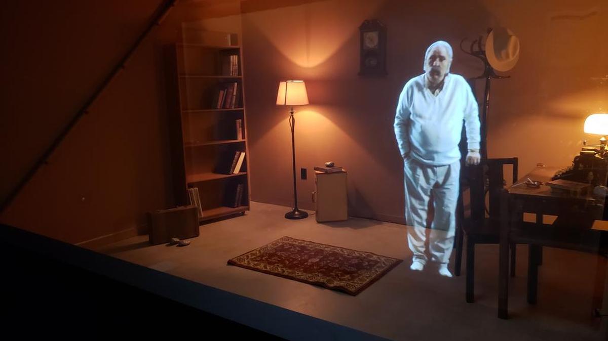 A hologram of acclaimed novelist and playwright William Saroyan speaks to visitors during the grand opening of the William Saroyan House Museum in central Fresno in September.