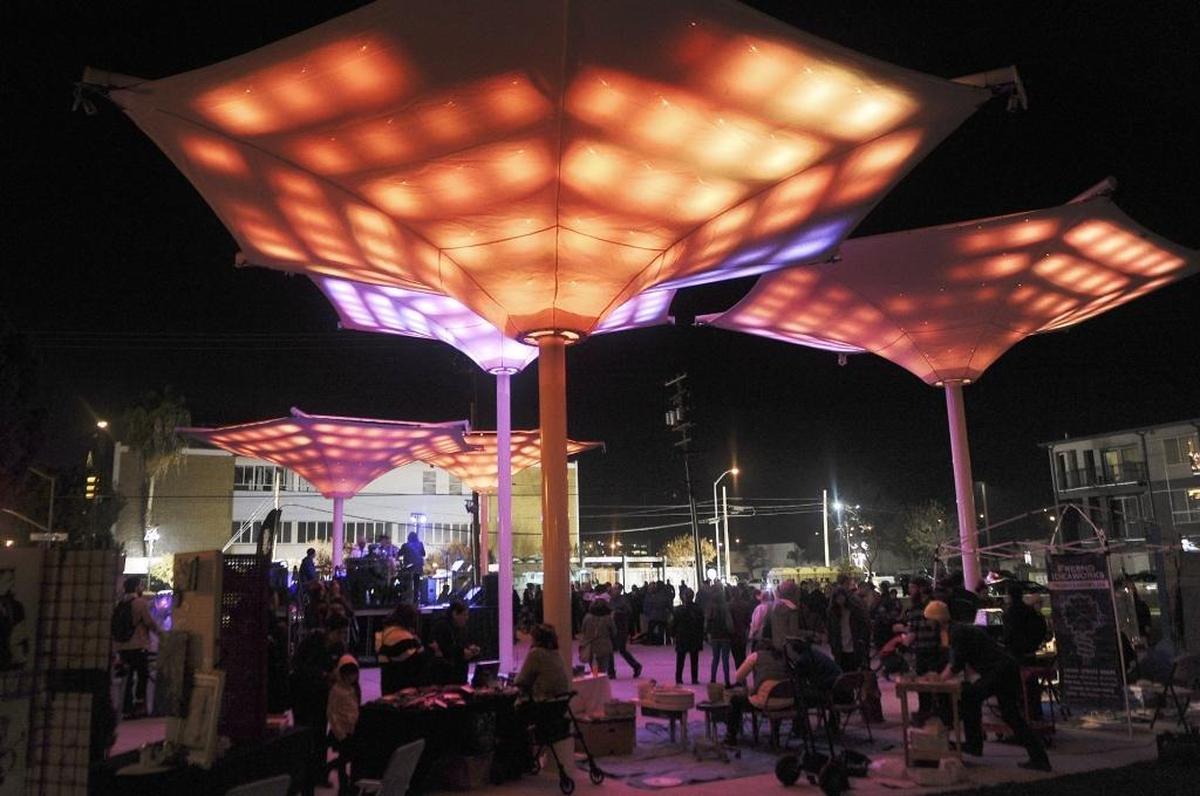 The Cultural Arts District Park is located at Calaveras and Fulton Streets in downtown Fresno. The tall upright structures pulse with motion-activated lighting.