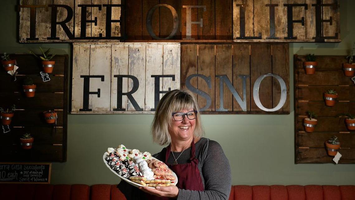 Carolyn Ocheltree, Tree of Life Cafe and Bakery owner and executive chef, holds a platter of holiday cookies in this photo taken in 2016.