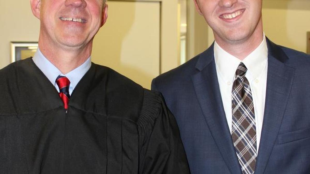 Fresno County Superior Court, Judge Jonathan Conklin,left, welcomed his son, Jason, into the membership of the California State Bar.
