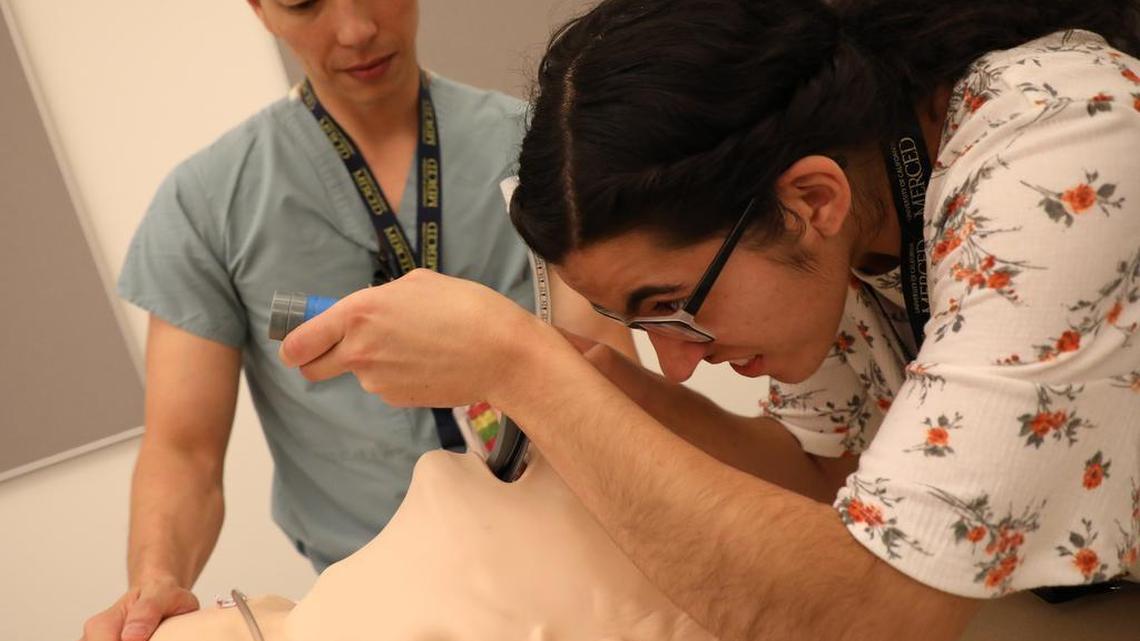 María Molina leans about air management with help from Dr. Anthony Lim during the Sept. 22 Reaching Out to Aspiring Doctors (ROAD) conference at the UCSF Fresno Center.