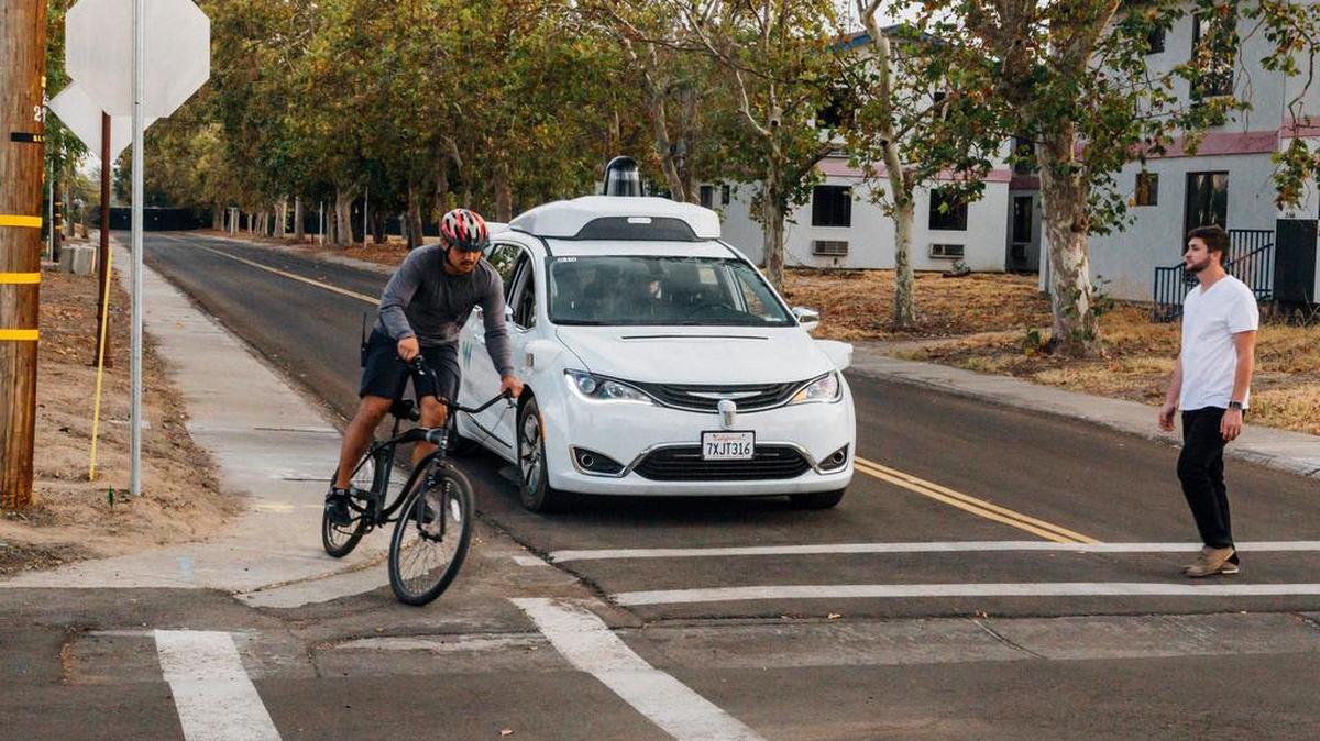 Chrysler Pacifica minivan equipped with Waymo’s self-driving car technology is being tested with the company’s employees as a biker and a pedestrian at Waymo’s facility in Atwater. Waymo, hatched from a Google project started eight years ago, showed off its progress last year during a rare peek at a closely guarded testing facility where its robots complete their equivalent to driver’s education.