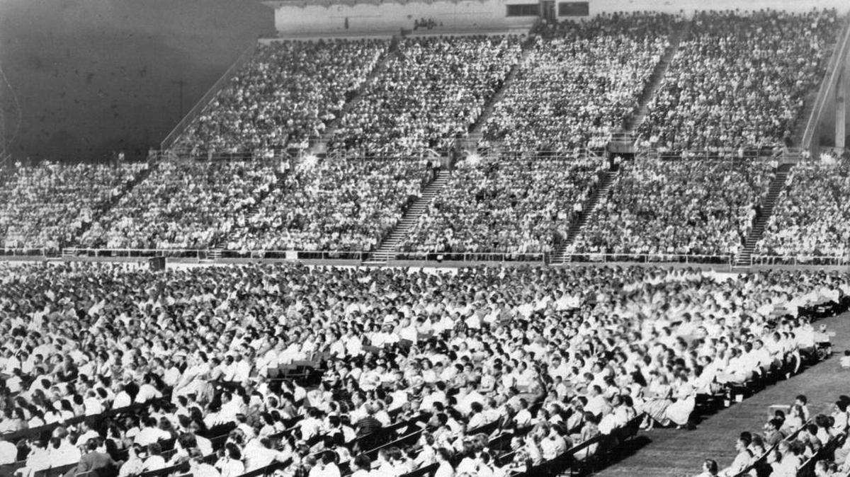 In Ratcliffe Stadium’s largest crowd, nearly 24,500 persons jammed Ratcliffe Stadium in 1962 to hear Evangelist Billy Graham declare “the entire world could be exploded . . . hydrogen bombs, atom bombs and missiles are Frankenstein monsters . . .” Tensely the stadium’s greatest gathering heard Graham plead with them to “accept Christ.”