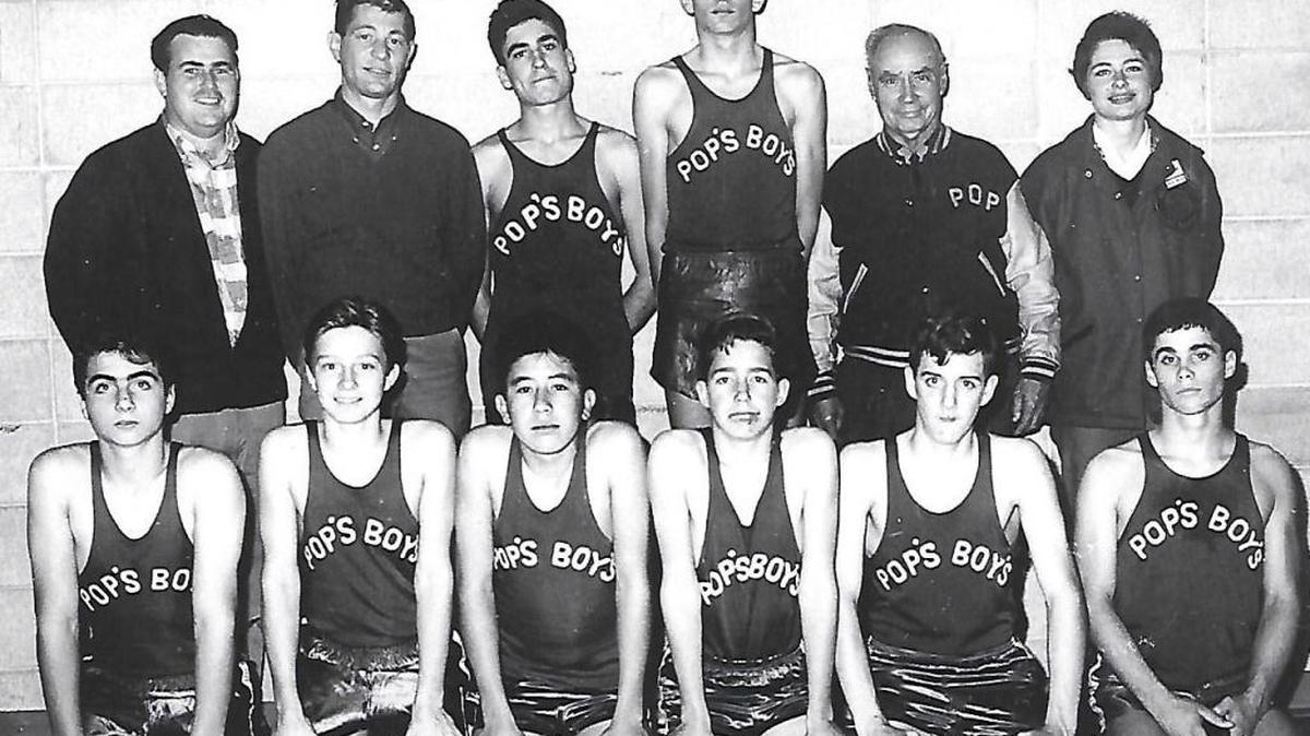 Dave “Pop” Rogers, back row, second from the right, with one of his basketball teams.