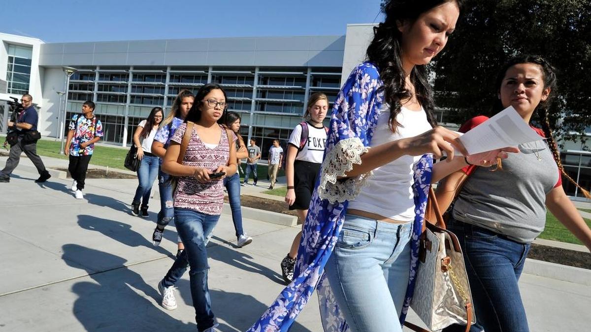 A group of students head to the auditorium for a morning assembly on the first day of classes at the new Phillip J. Patino School of Entrepreneurship in 2015. The Fresno Unified School District high school specializes in teaching students how to create their own businesses. It may be the first of its kind in the country.