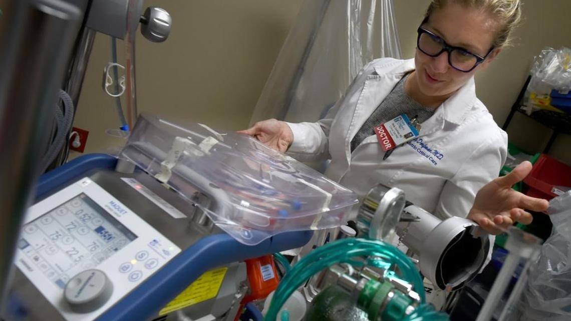 Dr. Molly Dorfman of Valley Children’s Hospital shows the ECMO (extracorporeal membrane oxyenation), which was used to save the life of baby Xavier Angel Rodriguez-Briones. It performed the function of his heart and lungs during surgery.