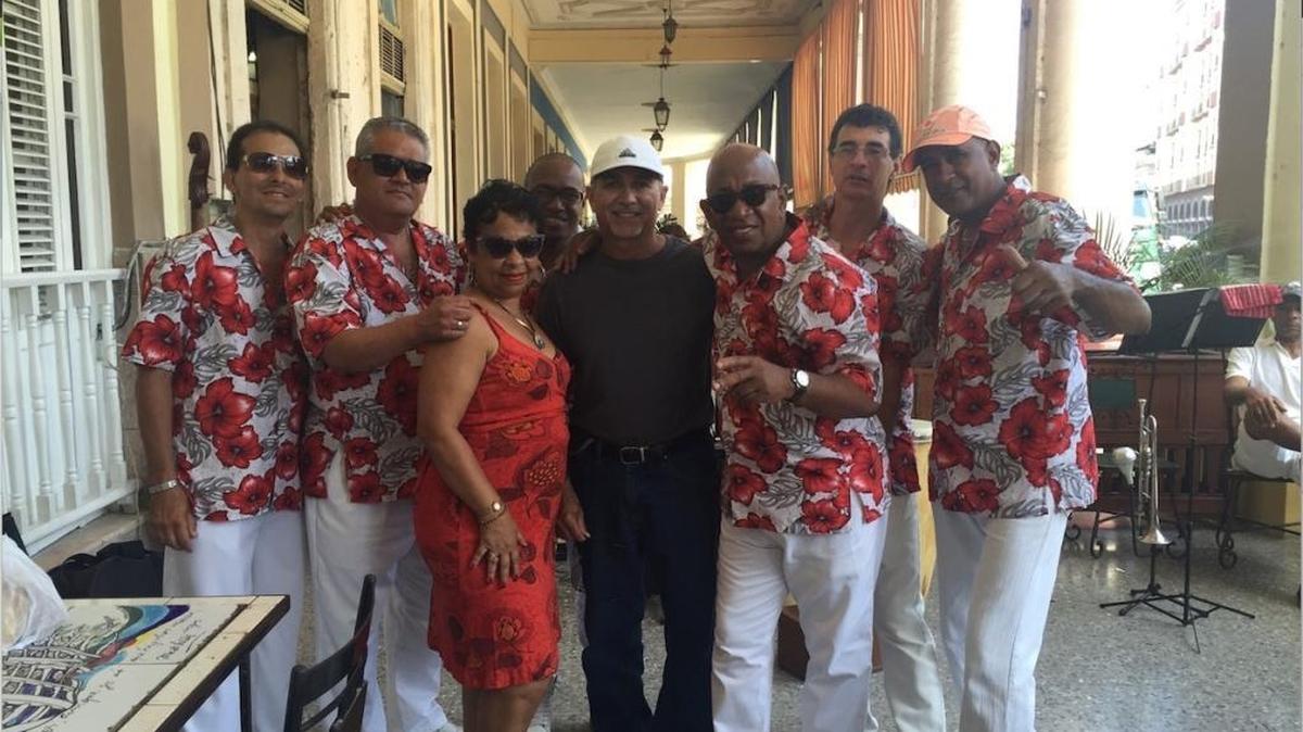 Steve Alcala, center, at the Inglaterra Hotel with Habana Mix, one of the many “son” groups that play in the city of Havana.