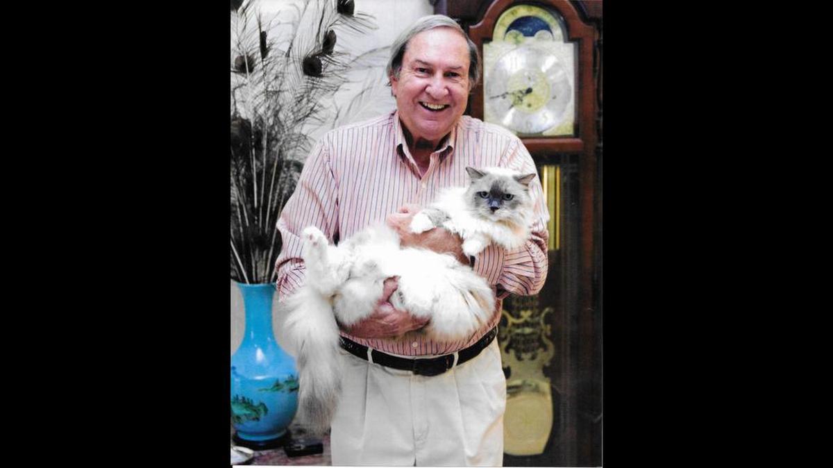 Elvin Bell and Abby the ragdoll feline.