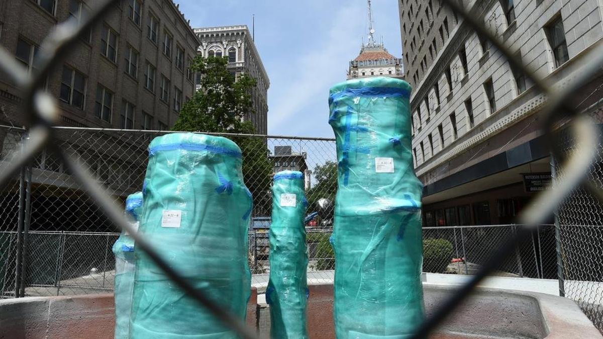 “Sculpted Pipes,” by Stanley C. Bitters, is wrapped in protective plastic before the move to Southern California for restoration and conservation, before being moved back and relocated.
