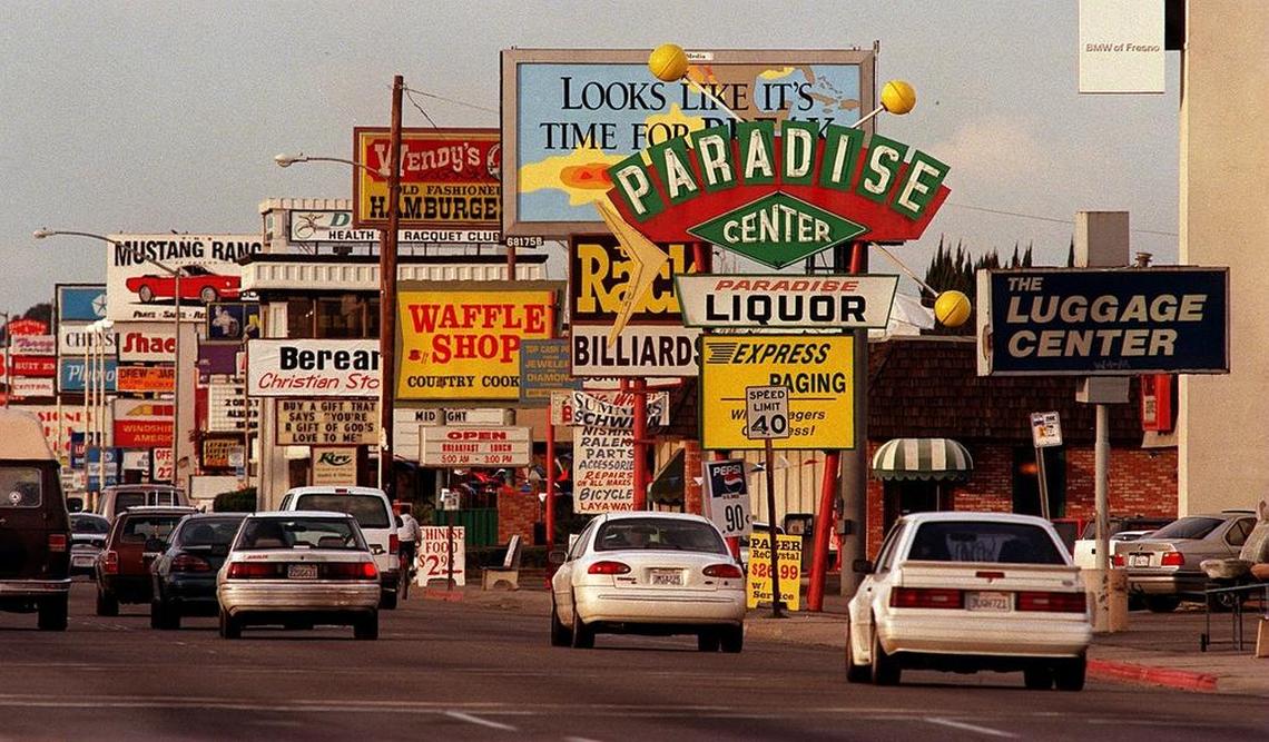 This file photo shows the concentration of shops along Blackstone Avenue in Fresno. A new effort is underway to redesign Blackstone so it can be a healthier roadway by accommodating bike paths and other uses.