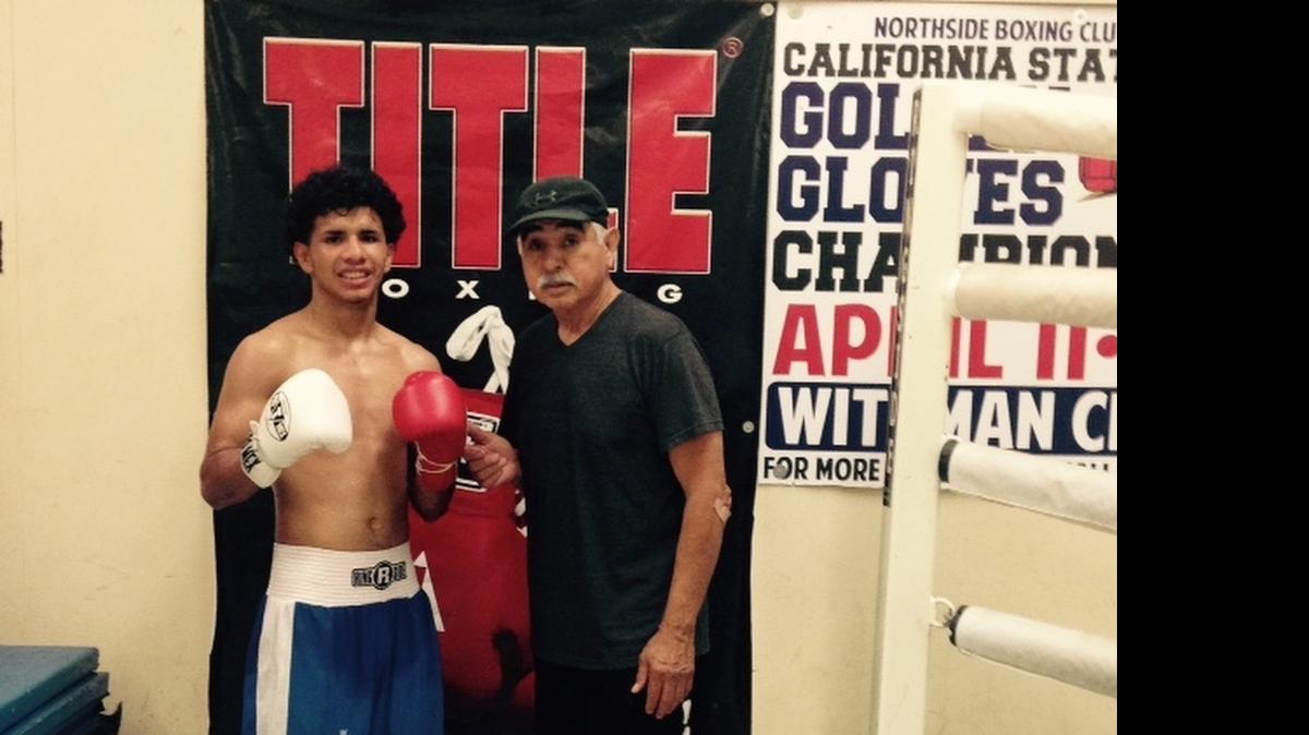 
Pete Santellano, right, says that the success of Isidro Ochoa illustrates the power of public parks and recreation programs in the lives of youth. Isidro has been with PAL Boxing since age 8. During that time he has won seven national amateur boxing titles and has been ranked No. 1 in the United States in three weight classes. Ochoa will compete for a spot on the U.S. Olympic Boxing Team beginning June 27. 
