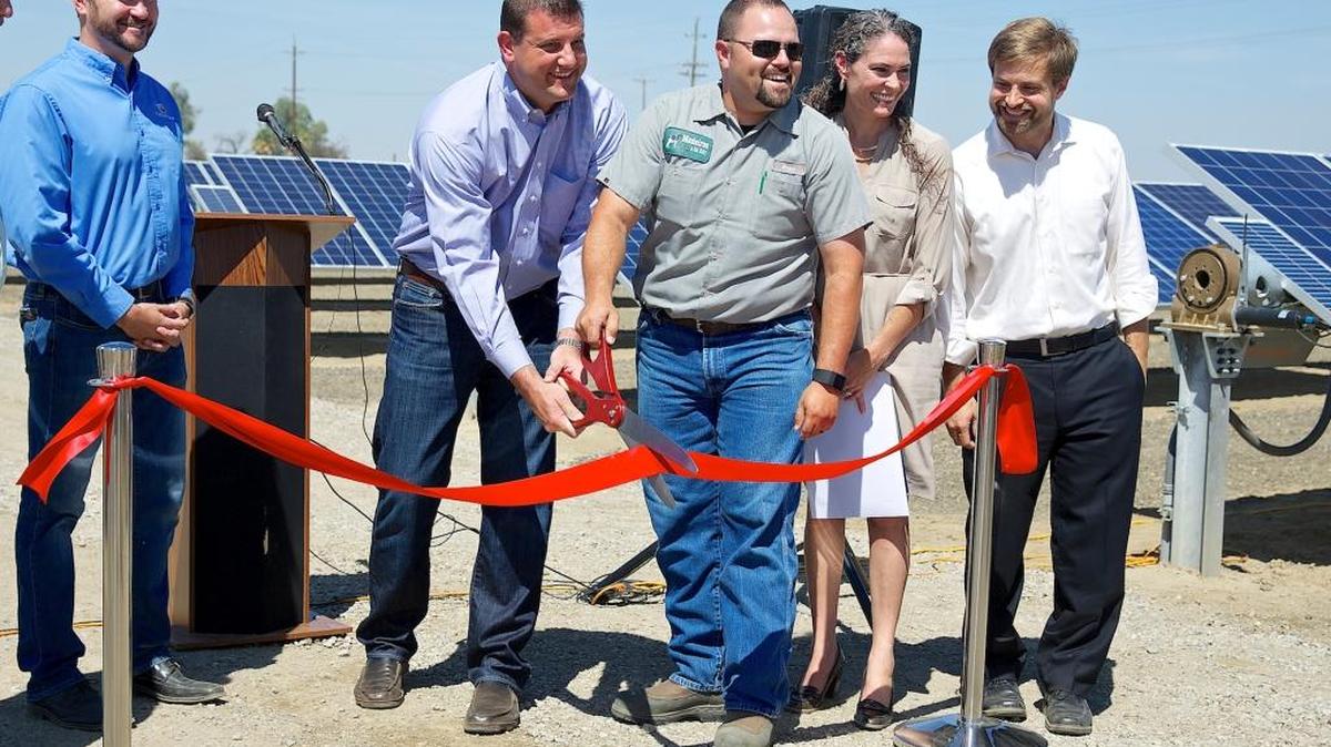 
Left to right: CalCom Solar CEO Nic Stover, Rep. David Valadao, dairyman Brian Medeiros, and Bernadette del Chiaro and Kelly Knutsen of the California Solar Energy Industries Association cut the ribbon on a 1.1 megawatt solar project at Medeiros & Son Dairy in Hanford.
