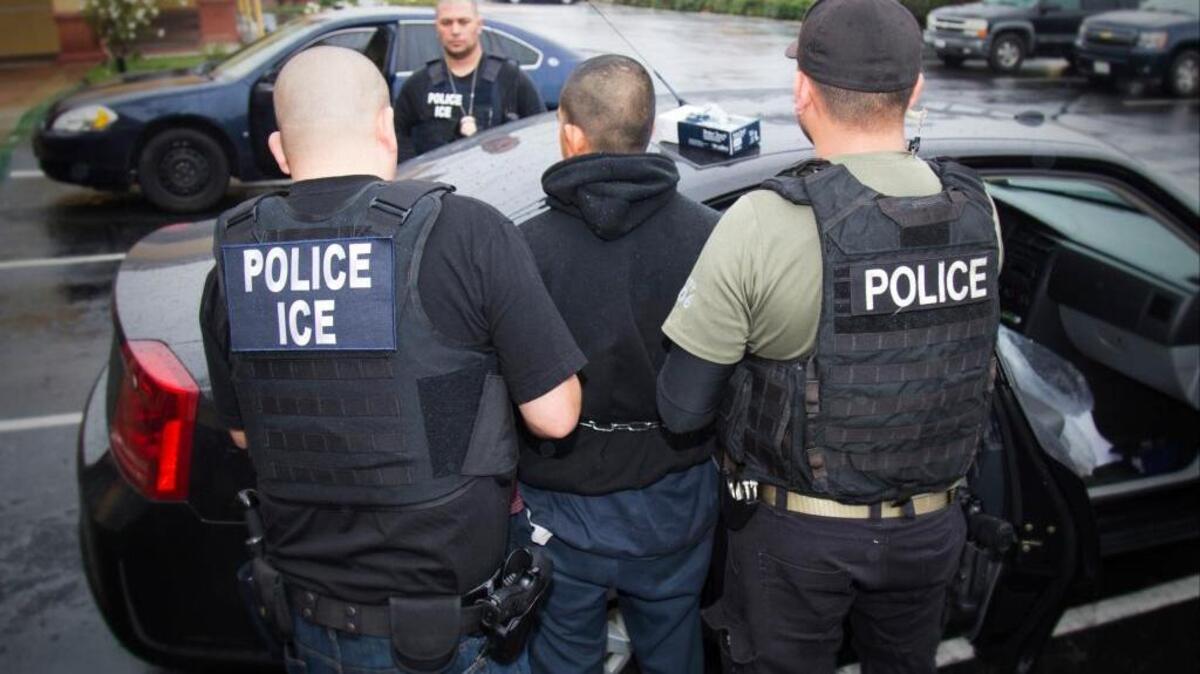 In this Feb. 7, 2017, photo released by U.S. Immigration and Customs Enforcement, foreign nationals are arrested during a targeted enforcement operation conducted by U.S. Immigration and Customs Enforcement aimed at immigration fugitives, re-entrants and at-large criminal aliens in Los Angeles.