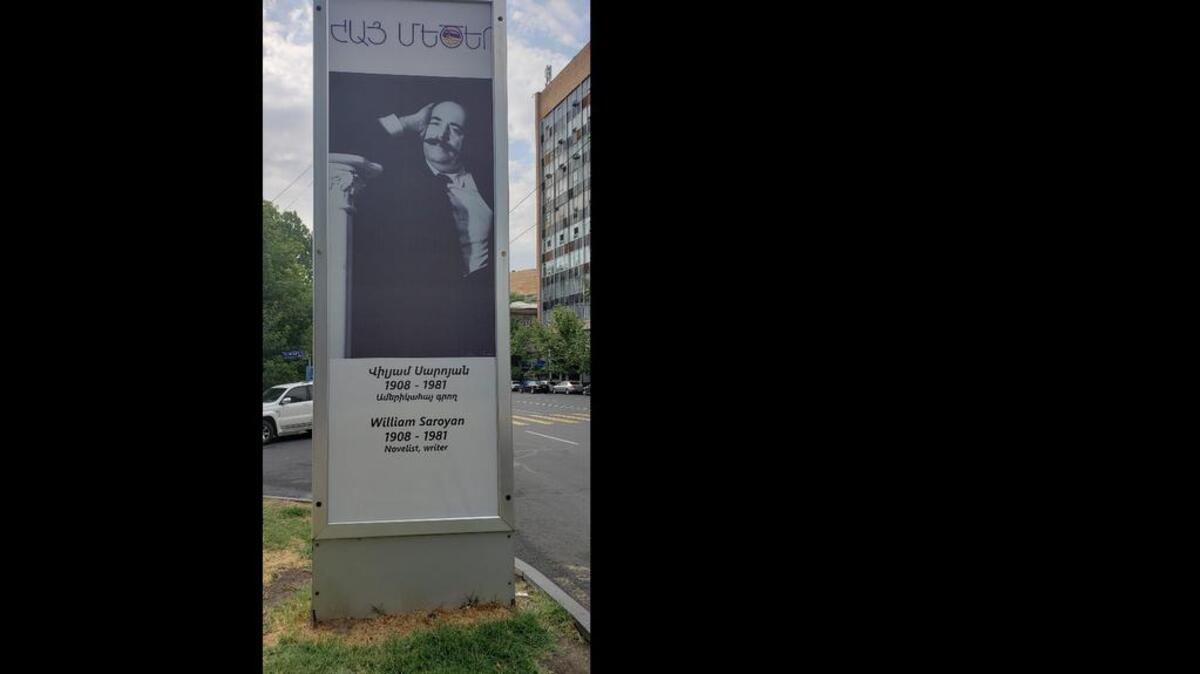 William Saroyan is shown on a sign in downtown Yerevan, Armenia.