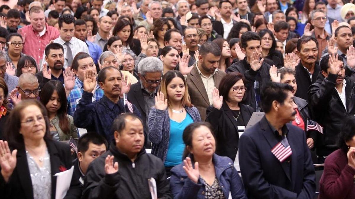 More than 600 immigrants become U.S. naturalized citizens in Fresno in March, 2016.