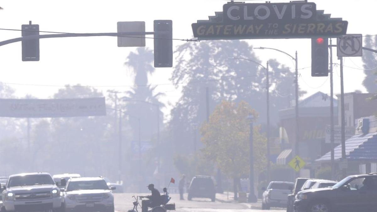 Smoggy days, like this one in Old Town Clovis in November 2014, are what the San Joaquin Valley Air Pollution Control District is working to reduce.