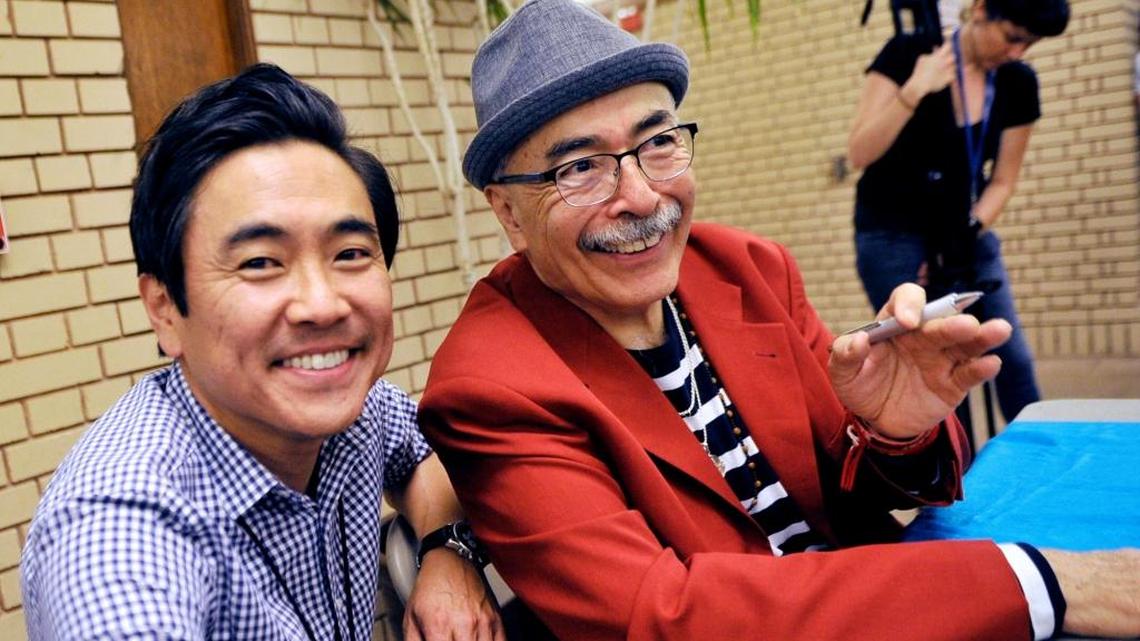 Fresno Poet Laureate Lee Herrick, left, smiles as he poses next to Juan Felipe Herrera, the 21st United States Poet Laureate, during last year’s LitHop.