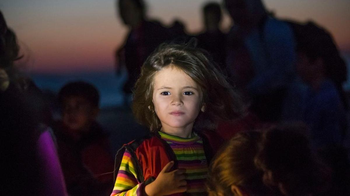 
A migrant girl looks toward the sea as they arrive on a dinghy at the southeastern island of Kos, Greece, after crossing from Turkey Aug. 13. Greece has become the main gateway to Europe for tens of thousands of refugees and economic migrants, mainly Syrians fleeing war, as fighting in Libya has made the alternative route from north Africa to Italy increasingly dangerous.
