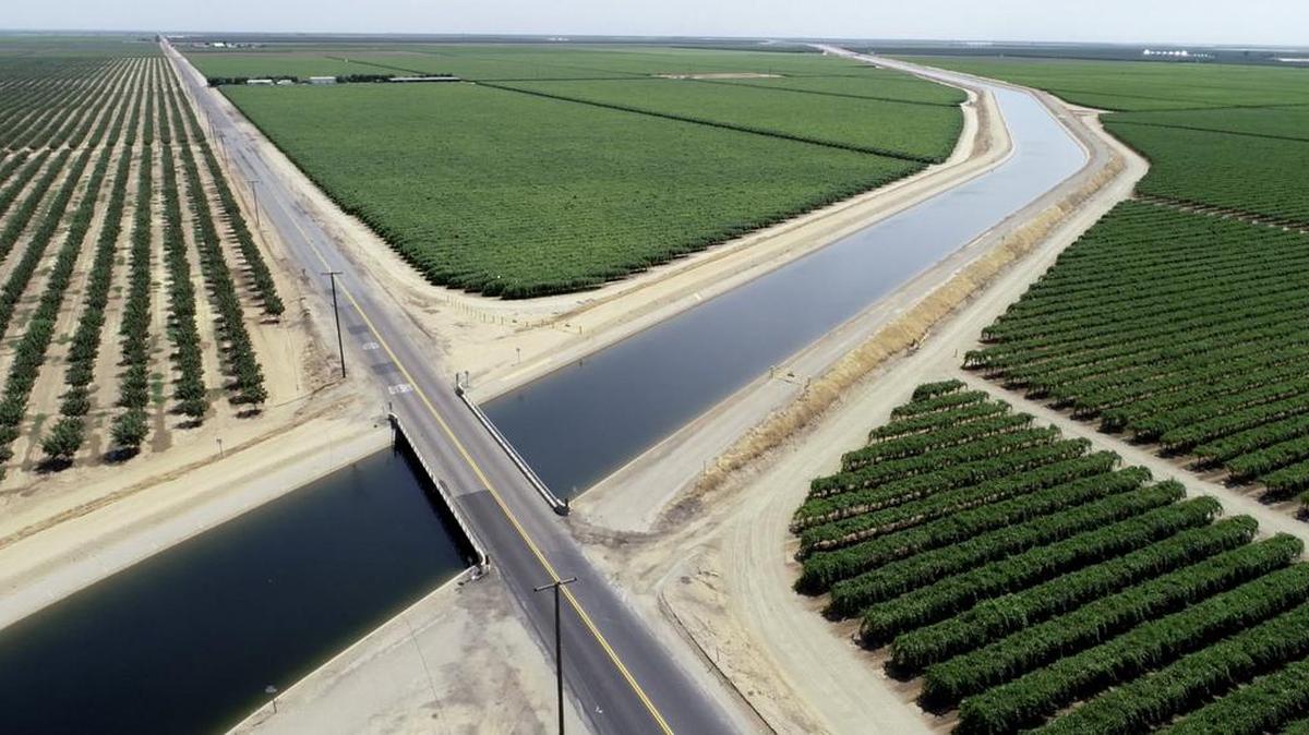 The Friant-Kern Canal in the San Joaquin Valley is sinking as parts of the San Joaquin Valley floor collapse because of subsidence, the result of excessive groundwater pumping during the drought. Bridges in this area of the canal, near Terra Bella, used to be 12 feet above the water’s surface. Now there is just one foot of clearance.