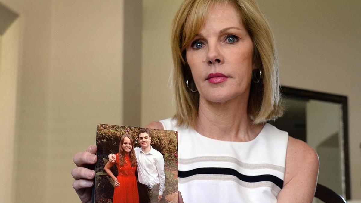 Jody Hudson holds a photo of her daughter Alex and son Garrett at her home in Fresno on Thursday, May 10, 2018. Hudson is on a campaign to educate people about Lyme disease. Her daughter, Alex, a college student, died of Lyme disease that was misdiagnosed.