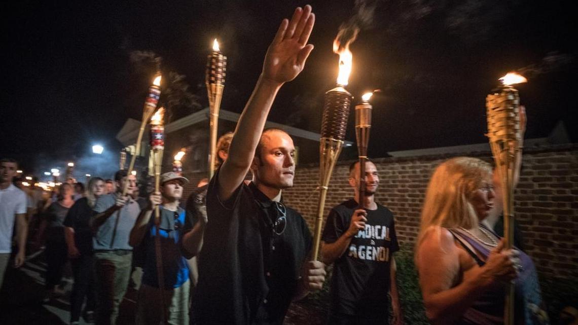 Chanting “White lives matter!” “You will not replace us!” and “Jews will not replace us!” several hundred white nationalists and white supremacists carrying torches marched in a parade through the University of Virginia campus on Aug. 11.