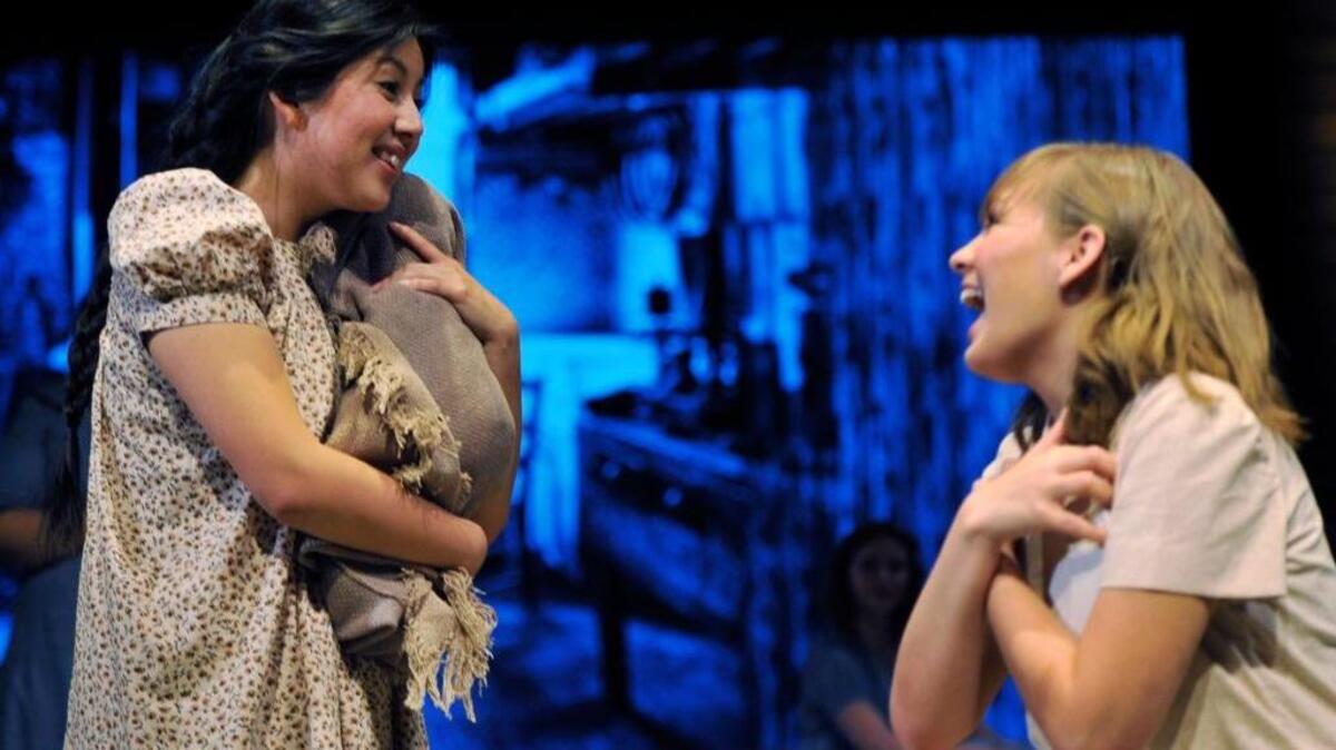 Karina Rodriguez as Lupe, left, and Chlorissa Larkin as Janey, right, seen during dress rehearsal for ‘Blue Willow’ at Fresno State’s John Wright Theater May 3, 2016. The university is studying the possibility of building a new performing arts center.