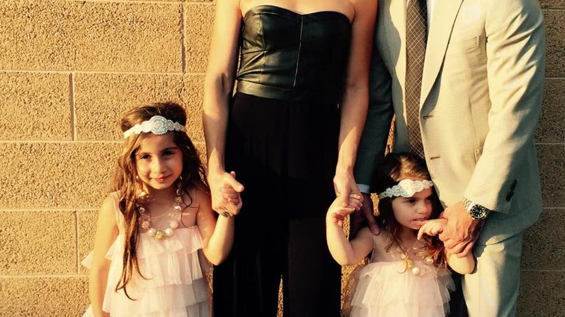 Jill Simonian with her two daughters, flower girls in a recent family wedding, and her husband, Dr. Andre Panossian.