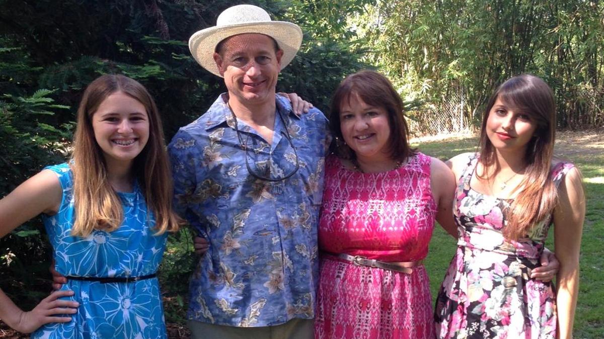 Patrick and Danell TeNyenhuis (center, left and right) and family. Patrick died in a collision with a car while riding his bicycle in April 2016.