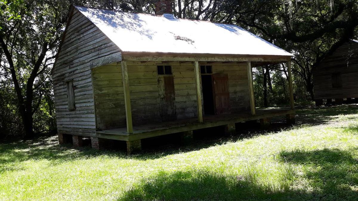 A single-room home that remains at a plantation near New Orleans.