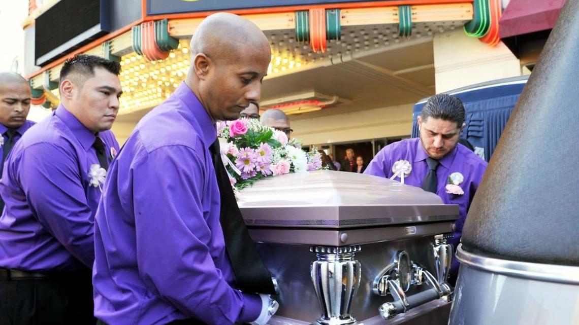 Pallbearers load the casket into the hearse outside Cornerstone Church where a memorial service was held for Janessa Danielle Ramirez on January 24, 2015 in Fresno. Janessa, 9, was killed by a stray round believed to be fired by a gang member as she stood with her mother outside a laundromat.