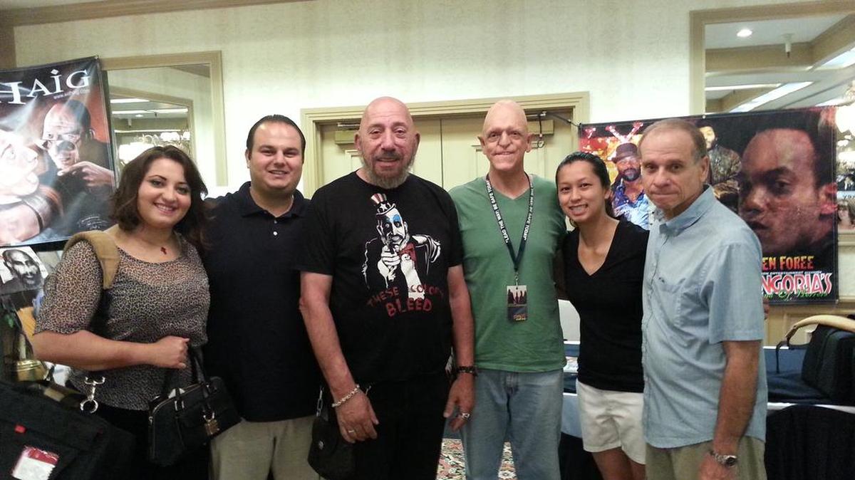 The show’s production team posing for a picture with Sid Haig. From left, Susie Tateosian, Sevag Tateosian, Sid Haig, actor Michael Berryman, Bestina Mounenalath and Gary Johnson.
